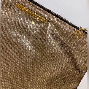 Victoria’s Secret gold makeup bag